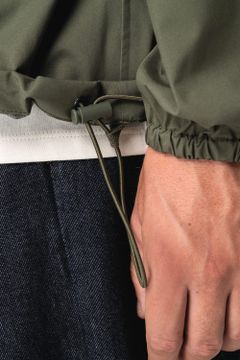 Wasserdichte Unisex-Windjacke mit Viertel-Reißverschluss, Foto 9